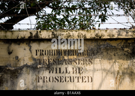 Razor wire is used to discourage traspassers who might think about climbing into a naval compound in Kochi, India. Stock Photo