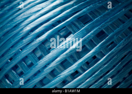 Closeup of a ball of blue synthetic string Stock Photo