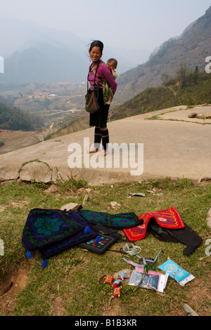 Woman from Black Hmong hill tribe selling souvenirs, Sapa, Vietnam Stock Photo