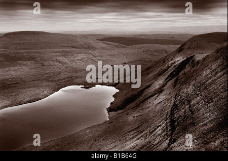 This is an elveated view looking down on the LLyn Y Fan Fawr reservoir in the black mountains. Stock Photo