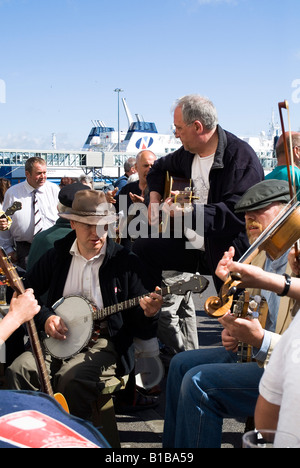 dh Stromness Folk Festival STROMNESS ORKNEY Traditional Musicians group playing banjo violins guitars banjoist music scottish band player Stock Photo