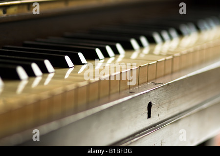 Old piano keys with shallow depth of field. Stock Photo
