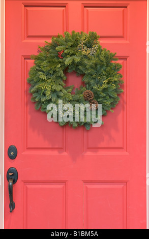 Red door with wreath Stock Photo