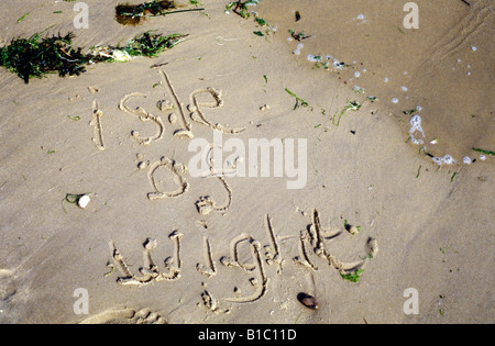 Isle of Wight written into the sand on the beach Stock Photo