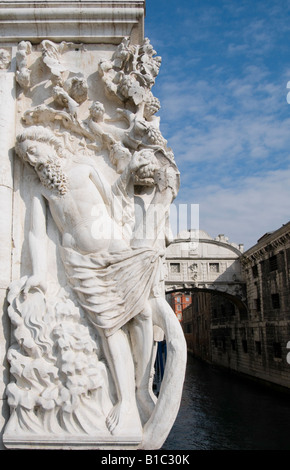 Venice, Veneto, Italy. Bridge of Sighs and detail from the Doge's Palace of 'The Drunkenness of Noah' Stock Photo