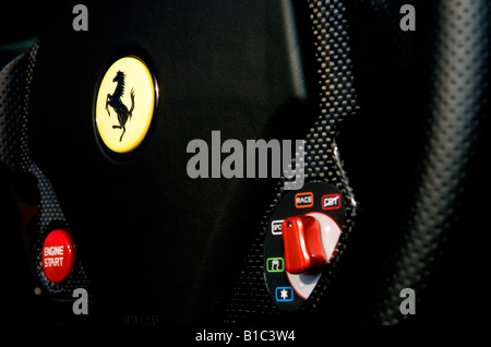 Close-up of Ferrari F430 F1 Spyder steering wheel. Stock Photo