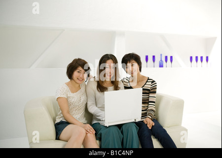 Young women using computer Stock Photo