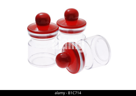 Three empty plastic condiment containers isolated on white Stock Photo