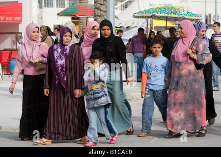 Tripoli, Libya, North Africa. Libyan Women and Children at International Trade Fair. Clothing Styles. Stock Photo