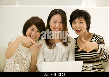 Young women using computer Stock Photo