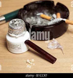 Crack pipe with a rock of crack cocaine Stock Photo - Alamy