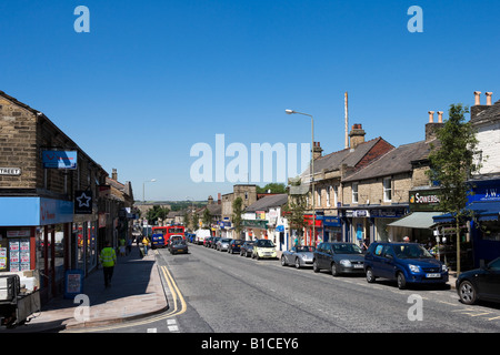 Shops on the High Street in the town centre, Glossop, Peak District, Derbyshire, England, United Kingdom Stock Photo