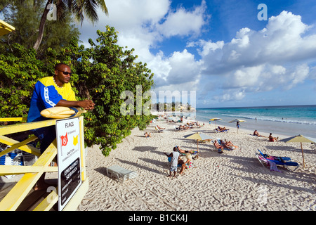 Lifequard observing Accra Beach Rockley Barbados Caribbean Stock Photo