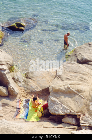 Couple on the beach. Playa de Aro. Gerona province. Catalonia. Spain. Stock Photo