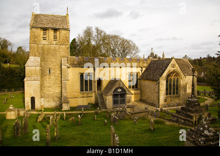 All Saint's Church, a Norman church with saddleback tower at North Cerney in the Cotswolds, Gloucestershire, England, UK Stock Photo