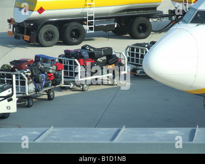 passenger luggage being transported at airport Stock Photo