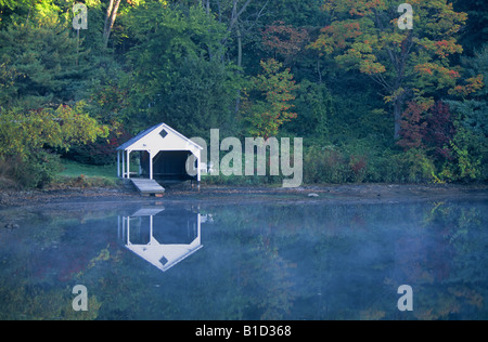 A beautiful boathouse sits next to a small lake in the Hudson Valley near Cold Spring New York Stock Photo