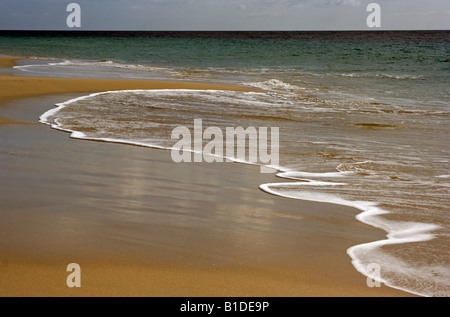 Wave patterns on the beach Stock Photo