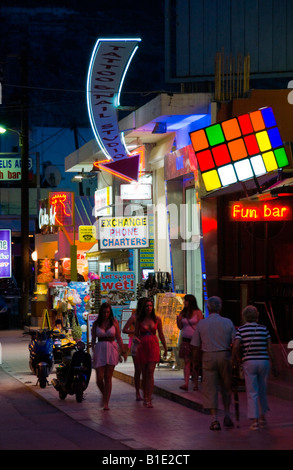 Night time on main street in Malia on the Greek Mediterranean island of Crete Stock Photo