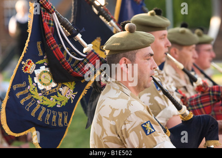 Military band of The Royal Regiment of Scotland bagpipers beating the retreat in Dumfries Scotland UK