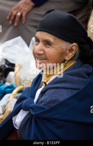Elderly Ecuadorian woman on Otavalo market in Northern Ecuador Stock Photo