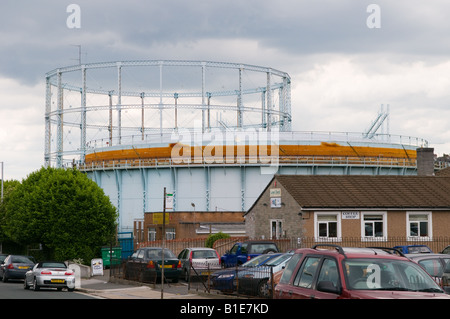 A gasometer partially empty during summer Stock Photo - Alamy