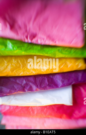 Close-up of folded green and yellow textile. Highlights coarse weave ...
