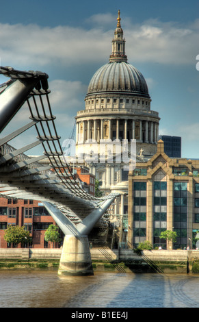 St Paul's Cathedral dome and millennium bridge over river Thames in 2008 Stock Photo