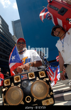 Marchers show off their homemade boomboxes at the 13th Annual National Puerto Rican Day Parade in New York on Fifth Avenue Stock Photo