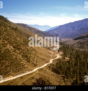 Bhutan Bumthang Valley road rising to the Yotang La Pass Stock Photo