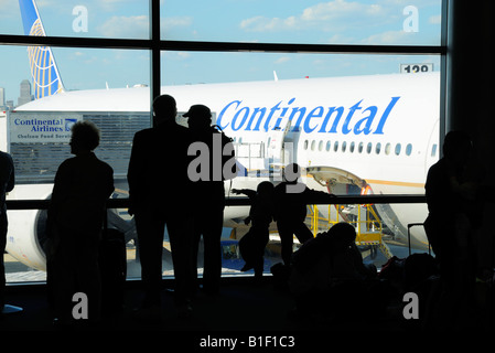 Passengers waiting at the gate to board a Continental flight, Newark airport NJ Stock Photo