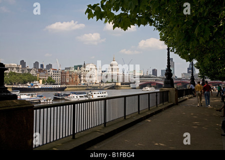 Walkway along the River Thames with St Pauls in the distance Stock Photo