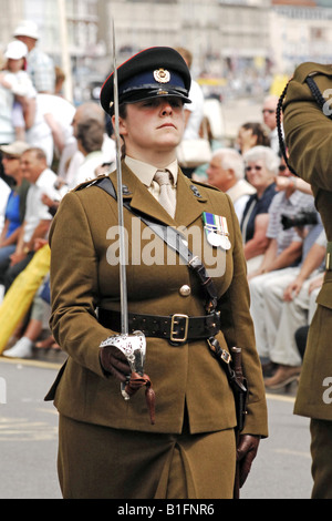 Small female Officer in the British Army marching in a welcome Home Parade Stock Photo