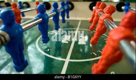 Close up of table football game, red and blue teams. Stock Photo