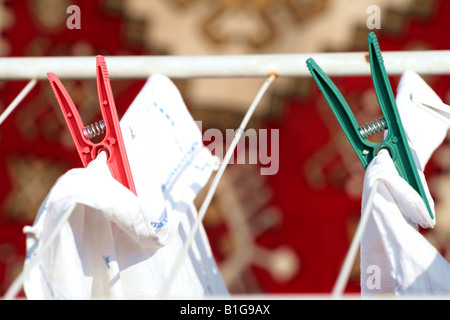 Closeup of clothes with clothes pins Stock Photo