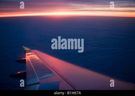 Airplanes wing in flight Stock Photo