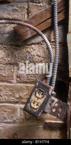Old Electrical Outlet During Demolition And Renovation Construction Detail Stock Photo