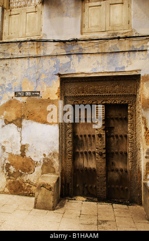 Hotel doorway in Stonetown Zanzibar, Tanzania, East Africa. Amyn Nasser amynnasser [room for copy] artisan artisanal organic Stock Photo