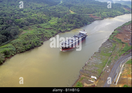 A view of a freighter making a daylight passage through the Panama Canal Stock Photo