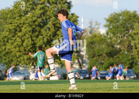 Soccer player warming up. Stock Photo