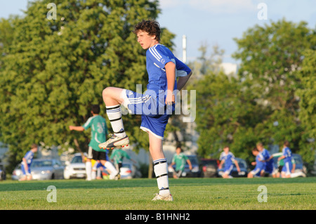 Soccer player warming up. Stock Photo