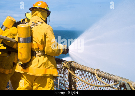 Pacific Ocean. Fire drill aboard container vessel, Horizon Anchorage. Stock Photo