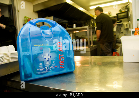 First aid kit in hotel or restaurant kitchen Stock Photo
