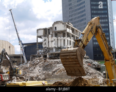 cranes and excavators at a construction site. Demolition of old houses, Germany, Saxony, Leipzig Stock Photo