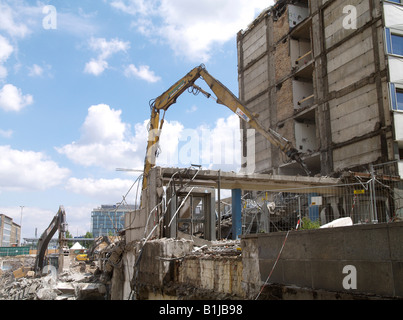 cranes and excavators at a construction site. Demolition of old houses, Germany, Saxony, Leipzig Stock Photo