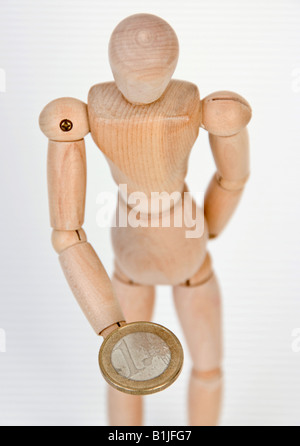 jointed doll with Euro coin Stock Photo