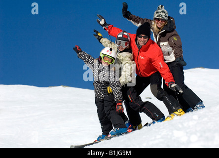 skiing family in winter holiday, France, Alps Stock Photo