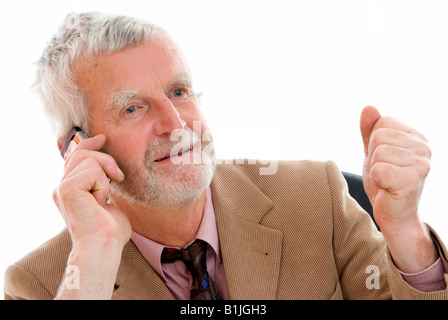 senior businessman with mobile phone Stock Photo