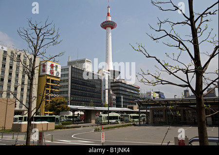 Kyoto, Japan. The central bus station, outside the main railway station, with the Kyoto Tower in the background Stock Photo