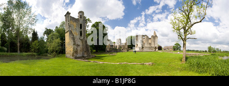 The ruins of Minster Lovell Hall lying between the church and the River Windrush, Minster Lovell, Oxfordshire Stock Photo